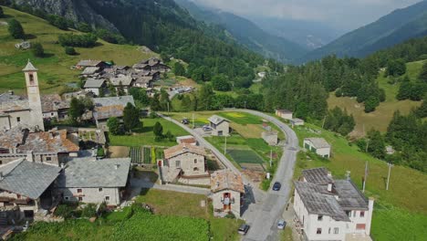 Alpine-village-from-the-drone,-Cottian-Alps,-Cuneo,-Piedmont,-Italy