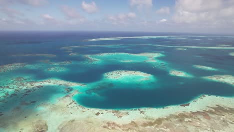 Stunning-aerial-pan-across-sandbar-coral-reef-archipelago-of-los-roques-venezuela