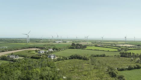 Panorama-Of-Countryside-Fields-With-Wind-Turbines-In-Daytime