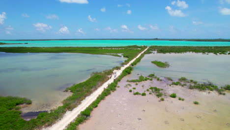 Aerial-above-Sian-Kaʼan-Reserve-a-biosphere-reserve-in-Tulum-Municipality-in-the-Mexican-state-of-Quintana-Roo,-drone-fly-above-tourist-attraction-in-Caribbean-Sea-Mexico