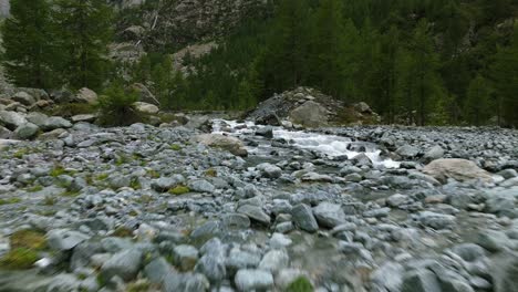 Val-Ventina-dry-riverbed-with-shallow-water-stream