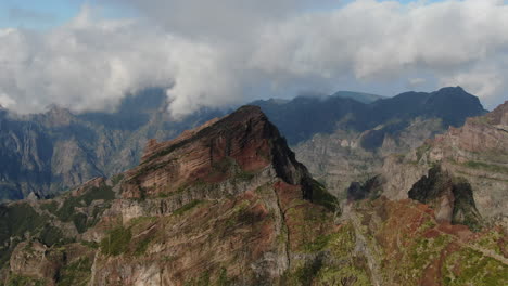Pico-Arieiro,-Madeira:-aerial-view-traveling-in-over-the-majestic-mountains-of-the-area-and-on-a-sunny-day