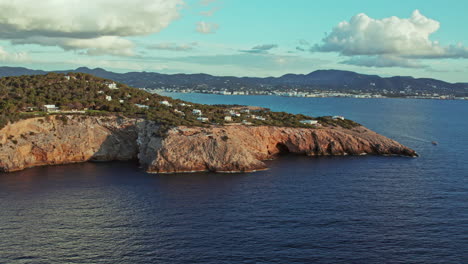 Aerial-Revealed-Coastal-Town-Of-Sant-Antoni-de-Portmany-On-Ibiza-Western-Coast-In-Spain