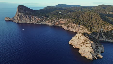 Panoramic-Aerial-View-Of-Cala-Salada-Cove-Beach-On-Sant-Antoni-de-Portmany-In-Ibiza,-Spain