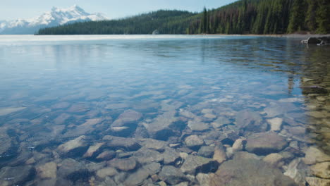Ice-Covered-Crystal-Clear-Water-of-Mountain-Lake-on-a-Sunny-Day-CU