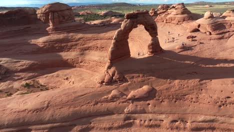 4K-aerial-of-Delicate-Arch-in-Arches-National-Park,-Utah,-USA