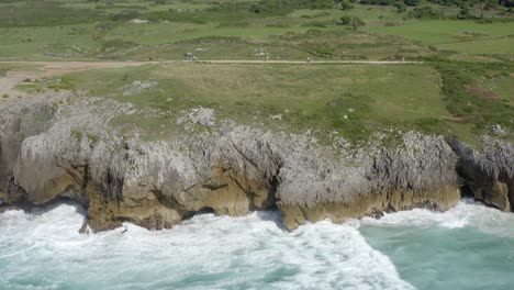Incredible-sea-cliffs-of-bufones-de-pria-asturias-spain-quick-aerial-pan