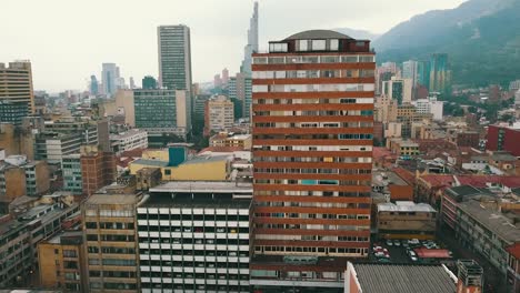Drone-view-of-one-of-the-tallest-buildings-in-the-centre-of-Bogotá,-Colombia