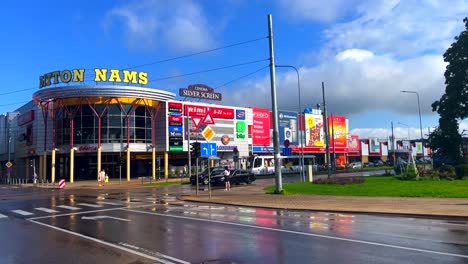Daugavpils-Latvia-shopping-centre-Ditton-Nams-with-tramway-during-summer