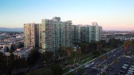 Drone-shot-residential-apartment-building-on-skyline-of-Los-Angeles
