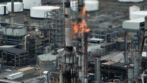Aerial-view-of-flames-in-front-of-a-gas-refinery---oil-production