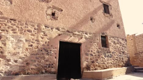 an-old-village-in-the-middle-of-the-desert-with-the-style-of-Arab-house