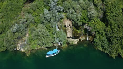 Tourist-Cruise-Boat-Near-Roski-Slap-Waterfall-In-Krka-National-Park,-Croatia
