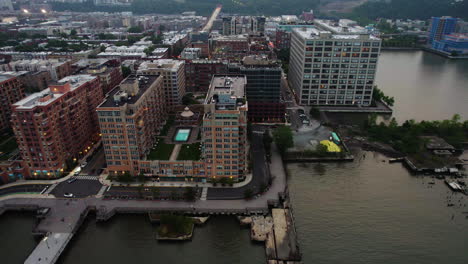 Aerial-view-away-from-riverside-apartments-of-Hoboken,-in-cloudy-New-Jersey