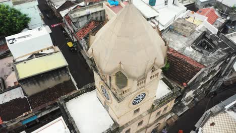 Aerial-view-of-Raya-Naka-in-which-the-camera-is-moving-very-quickly-around-the-clock-tower