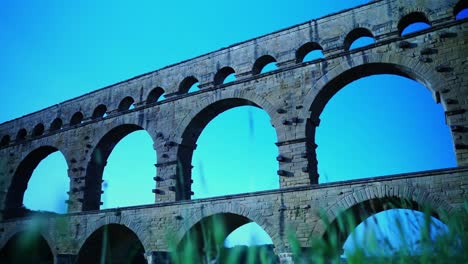 Old-Roman-stone-arch-bridge-in-France-as-a-water-pipe-of-history
