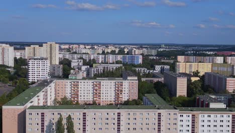 Spectacular-aerial-top-view-flight-Large-panel-system-building-Apartment,-prefabricated-housing-complex,-Berlin-Marzahn-East-German-summer-2023