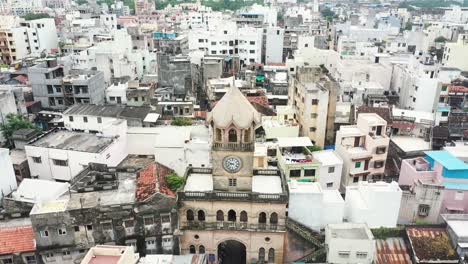 Raya-Naka-Tower-is-a-very-old-clock-tower-located-in-the-middle-of-Rajkot-city-surrounded-by-old-houses-and-new-high-rise-buildings