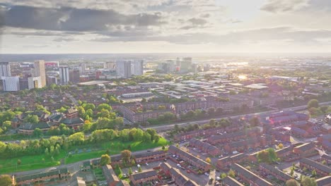 Aerial-during-golden-hour-of-the-skyline-of-Greater-Manchester-and-Old-Trafford-stadium