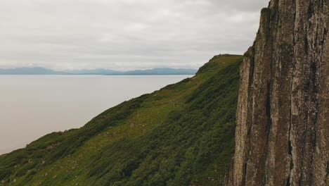 Scottish-Landscape,-Aerial-of-Cliffs-Near-Kilt-Rock-On-Isle-Of-Skye,-Scotland