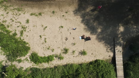 Bird's-Eye-View-Over-People-Relaxing-Near-The-River-In-Oronoco,-Minnesota,-USA---drone-shot