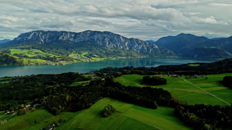 Stunning-aerial-view-of-Lake-Attersee-with-mountains-in-the-background