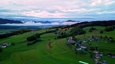Aerial-drone-dolly-in-shot-of-a-small-village-in-the-mountains-in-Austria