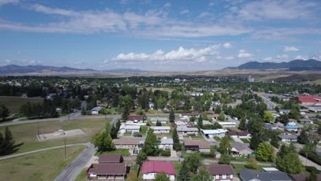 Aerial-view-of-residential-area-in-Lewiston,-Montana-with-mountains-in-background