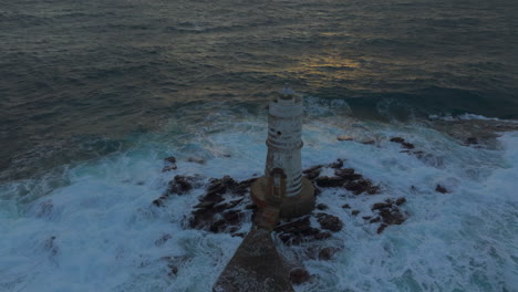 Mangiabarche-Lighthouse:-remote-aerial-view-of-the-beautiful-lighthouse-and-seeing-the-fantastic-sunset