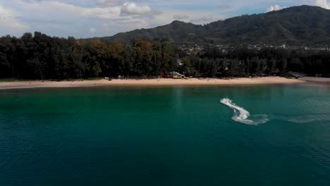 Empty-secluded-beach-in-Southeast-Asia,-Establish-shot-of-luxury-Phuket-Andaman-Sea,-4K-Droneshot
