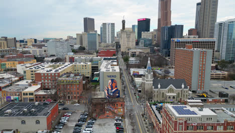 Panoramic-aerial-view-of-John-Lewis-Hero-wall-mural,-Historic-Buttler-Street-and-neighborhood,-Atlanta,-Georgia,-USA