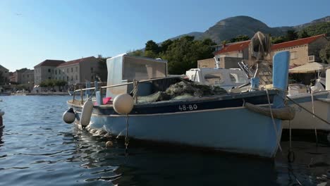 Traditional-fishing-boat-in-seaside-coastal-town,-Bol,-Croatia