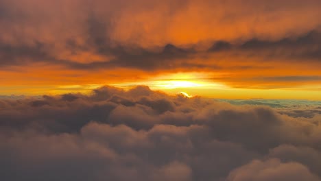 Stunning-orange-color-sky-during-a-sunset,-as-seen-by-the-pilots-of-an-airplane-flying-at-10000m-high
