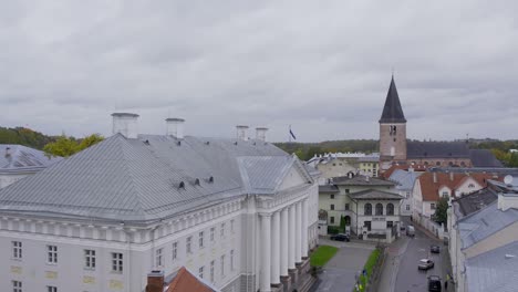 main-building-of-Tartu-university,-drone-flight-over-it