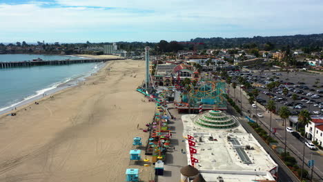 Aerial-view-over-the-Santa-Cruz-Beach-Boardwalk-Amusement-Park,-in-sunny-CA,-USA