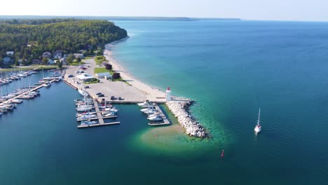 Wide-Aerial-Footage-of-Sailboat-Marina-and-Shore-in-Georgian-Bay,-Ontaria,-Canada