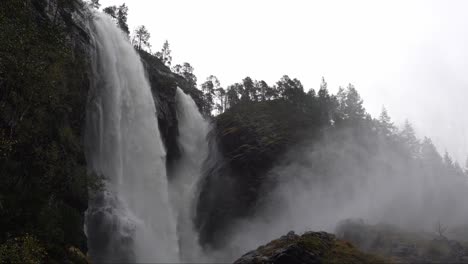 Massive-Hesjedalsfossen-waterfall-during-heavy-rain-in-Stamneshella-Norway