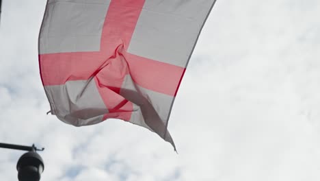 Close-up-shot-of-England's-flag-waving-in-the-wind