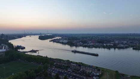 Kinderdijk-Serenity:-Drone-River-Journey-at-Dawn