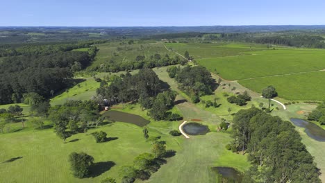 Aerial-view-of-Obera-Camellias-Golf-course-surrounded-by-trees-and-tea-plantations-in-Misiones,-Argentina