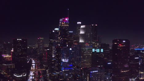 Aerial-drone-view-of-Downtown-Los-Angeles-at-night