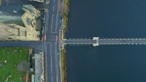 Flying-above-Grieg-Street-bridge-across-the-River-Ness-from-Old-High-Church-Inverness