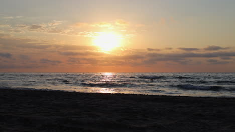 Calm-Mediterranean-Sea-and-Sandy-Beach-at-Sunrise,-Benicàssim-Seascape-in-Spain