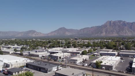Wasatch-Front-Mountains-on-Summer-Sunny-Day-in-Salt-Lake-City,-Aerial