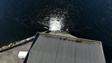 Hydroelectric-Powerstation-Fossmark-Norway,-High-angle-aerial-above-roof