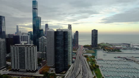 Aerial-pan-shot-of-the-lakefront-and-the-New-Eastside,-fall-evening-in-Chicago