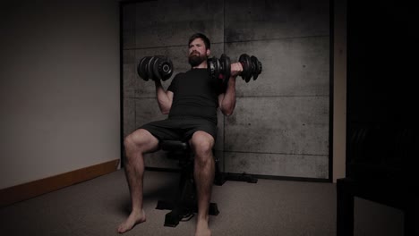 Seated-incline-dumbbell-curls,-cinematic-lighting,-white-man-dressed-in-black-gym-attire