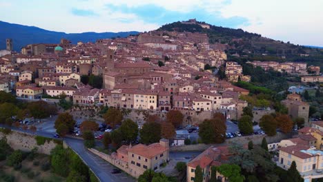 Magic-aerial-top-view-flight-Historical-Hill-Town-Cortona-Tuscany-Arezzo-Italy