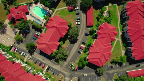 Bird-eye-aerial-over-colorful-red-rooftops-in-Bradenton,-Florida