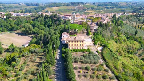 road-Beautiful-aerial-top-view-flight-Tuscany-Medieval-Village-Mediterranean-Wine-growing-region-drone-camera-pointing-down